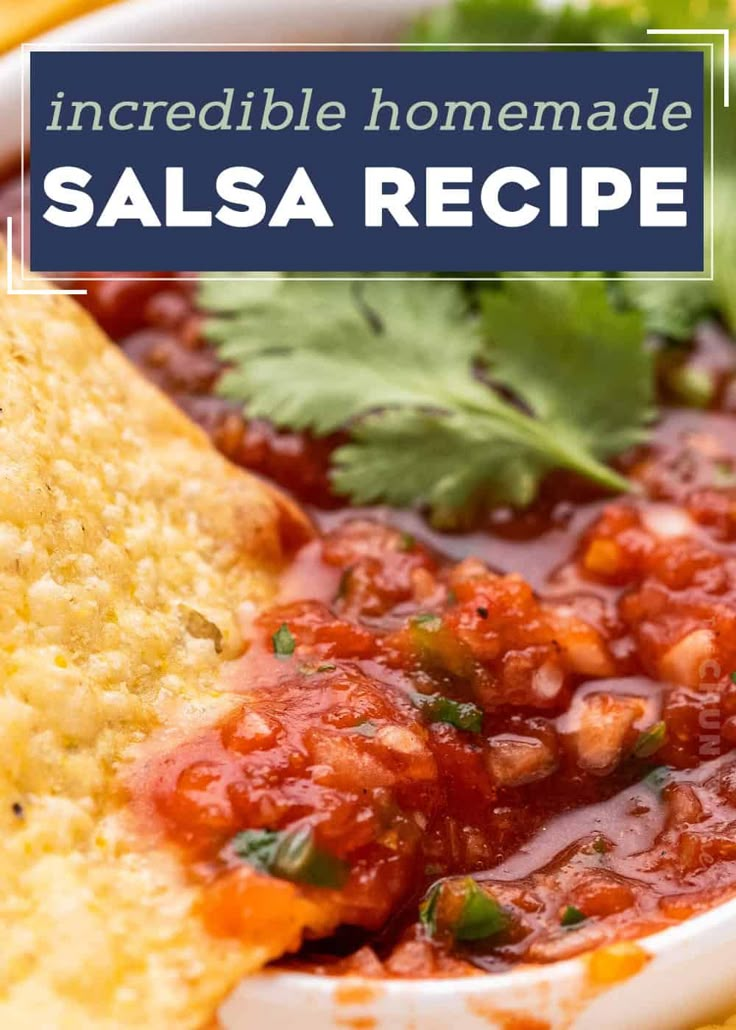 salsa in a bowl with tortilla chips and cilantro on the side