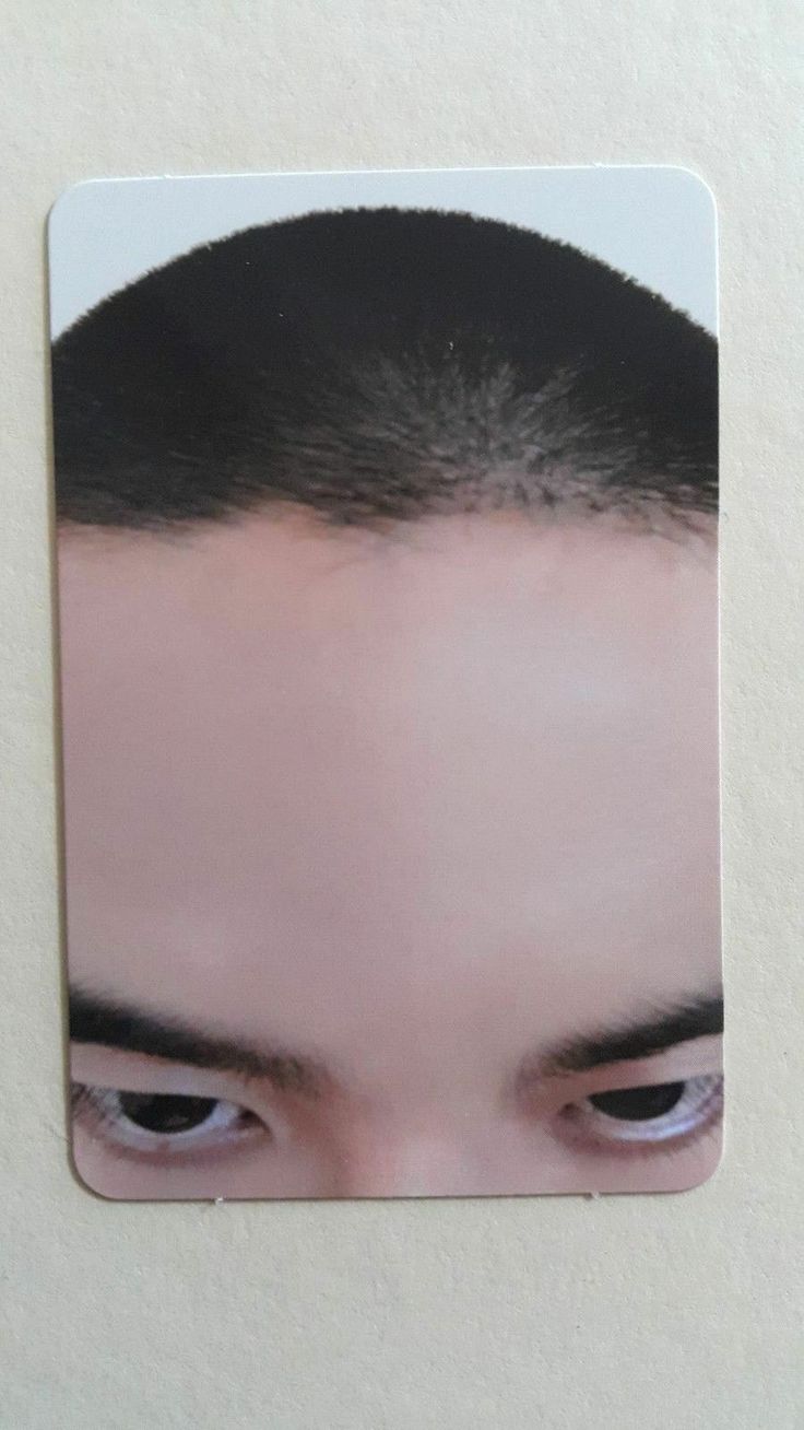 an image of a man's face with hair on top of his head and eyes