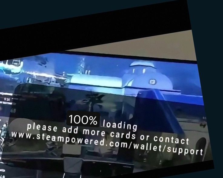 a tv screen with an advertisement on it that reads 100 % loading please add more cards or contact ww steam powered com / wallpaper support