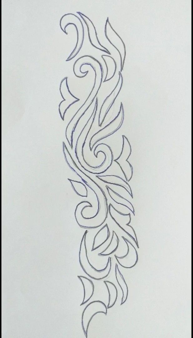 a drawing of a long feather on a sheet of paper with lines drawn across it