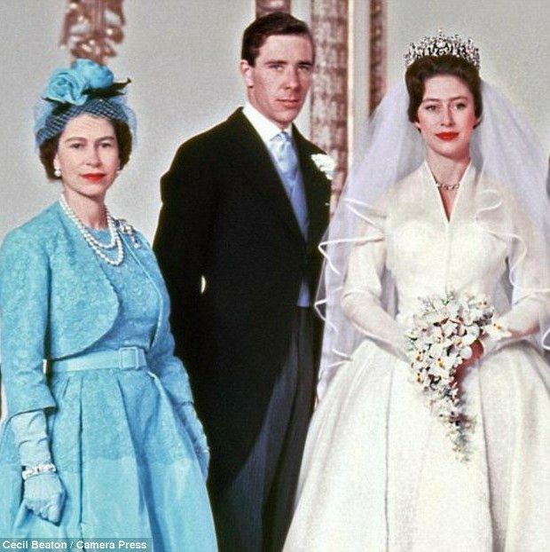 the royal family pose for a photo in their wedding gowns