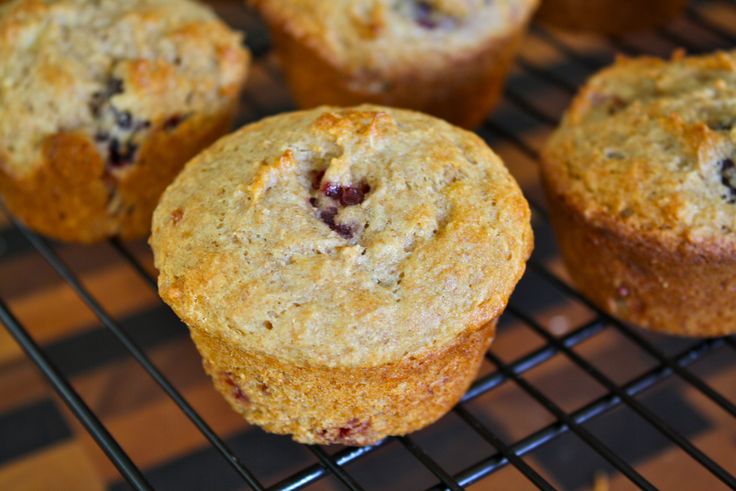 several muffins cooling on a wire rack