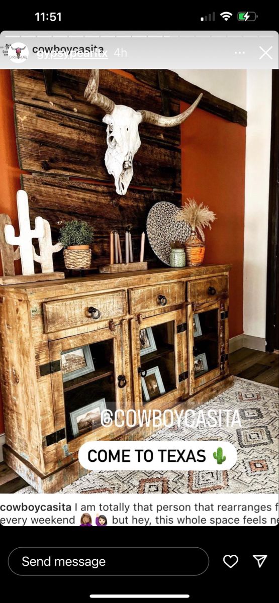 an old wooden sideboard with a cow skull on it's head and the words cowboycasta come to texas