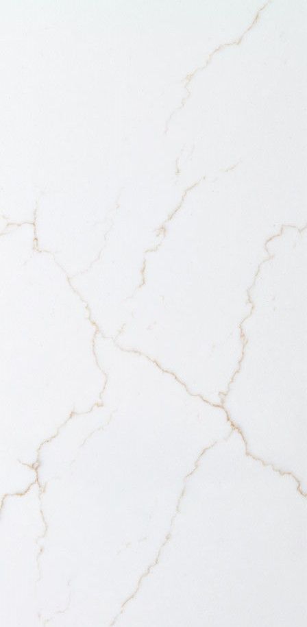 a white marble counter top with cracks in it