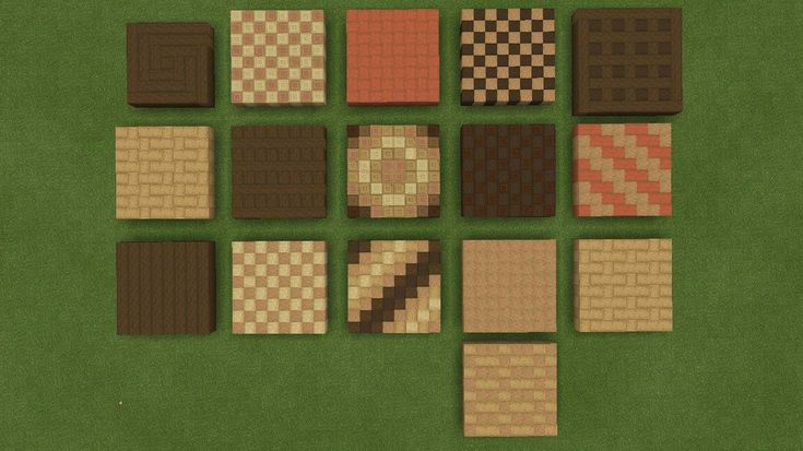 a bunch of different types of tiles on a green surface with white and brown squares