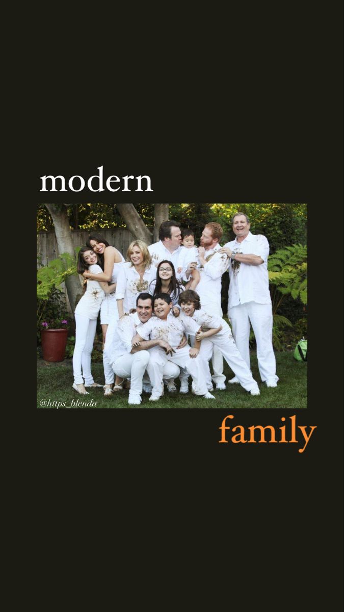 the modern family is posing for a photo in front of some trees and bushes with their arms around each other