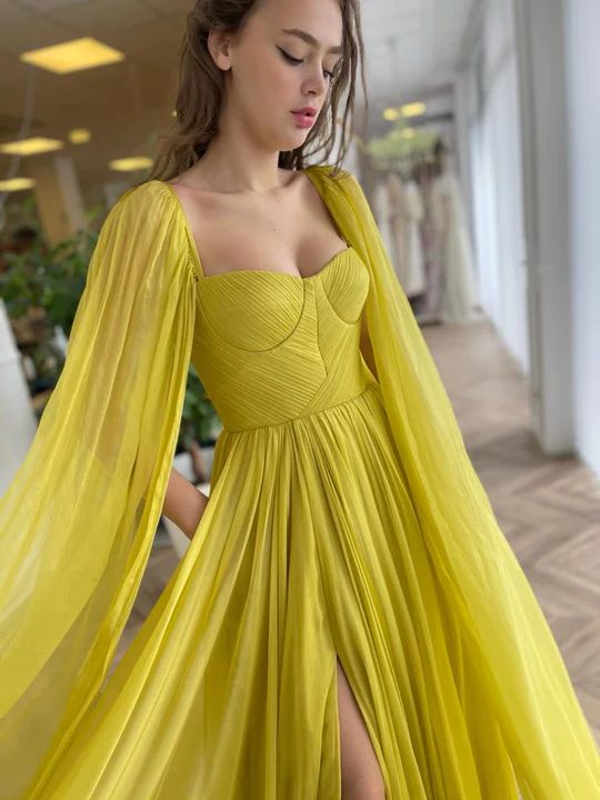 Anna Silky Citrine Gown | Teuta Matoshi Teuta Matoshi, Chiffon Prom Dresses, Dama Dresses, Long Cape, A Line Evening Dress, Yellow Silk, Wedding Dress Shoes, فستان سهرة, Quince Dresses