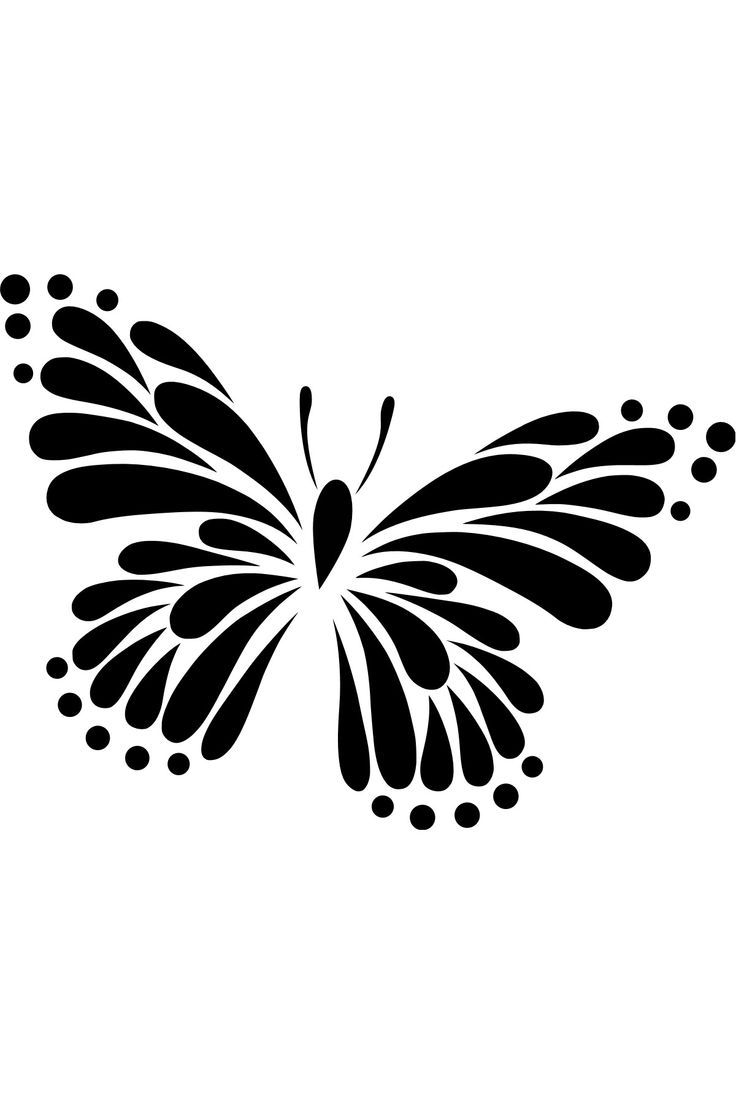 a black and white butterfly with dots on it's wings, flying in the air