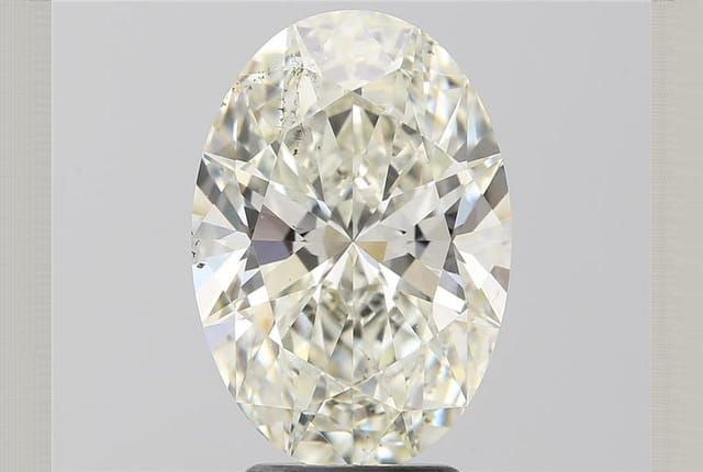 an oval cut diamond on a white background