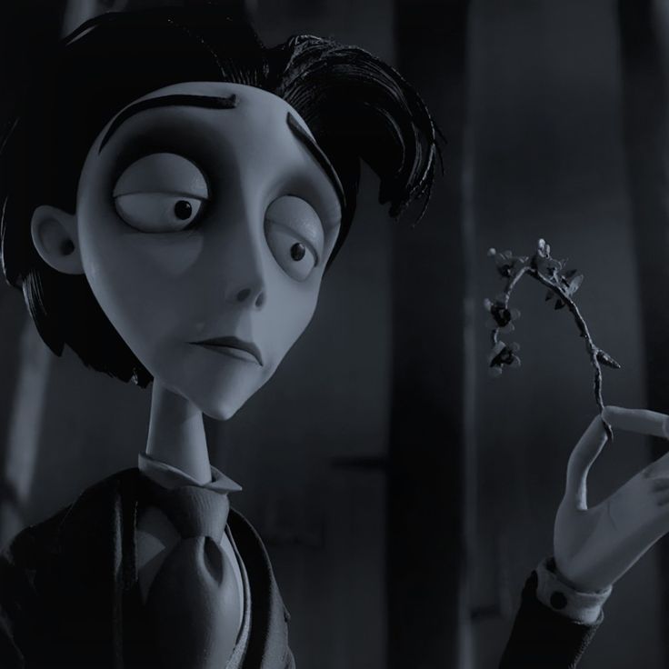 the animated character is holding a flower in her hand and looking at it with an evil look on her face