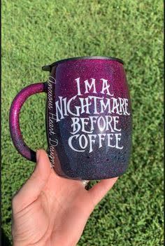 i'm a nightmare before coffee mug in purple with white writing on the inside