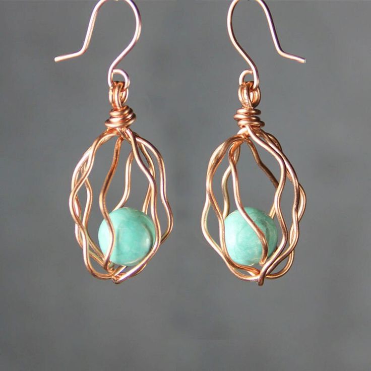 The unique cage wiring earrings are handmade using copper wiring and turquoise. Free US shipping. The Length of the earrings is 1 inches, 25mm. (excluding the length of hook) ;-) Enter my shop here: http://www.etsy.com/shop/AniDesignsllc?ref=pr_shop_more ;-) My contact number: 626-379-1904. Please contact me if you would like to order multiples or customize a design for your special event, I will be pleased to give you a discount on a quantity order. ;-) Purchases will be shipped within 1-3 busi Copper Wire Wrap Drop Earrings As Gift, Copper Wrap Earrings As A Gift, Copper Wrap Earrings For Gift, Unique Wire Wrapped Wrap Earrings As Gift, Hand Wrapped Copper Wire Earrings For Gifts, Handmade Rose Gold Wrap Earrings, Handmade Rose Gold Wrap Earrings Gift, Easy Earrings, Wire Earrings Handmade