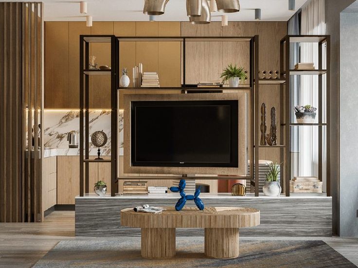 a living room with a large television mounted on the wall and a wooden table in front of it