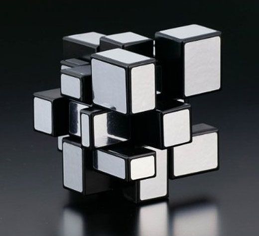 a black and white photo of several cubes