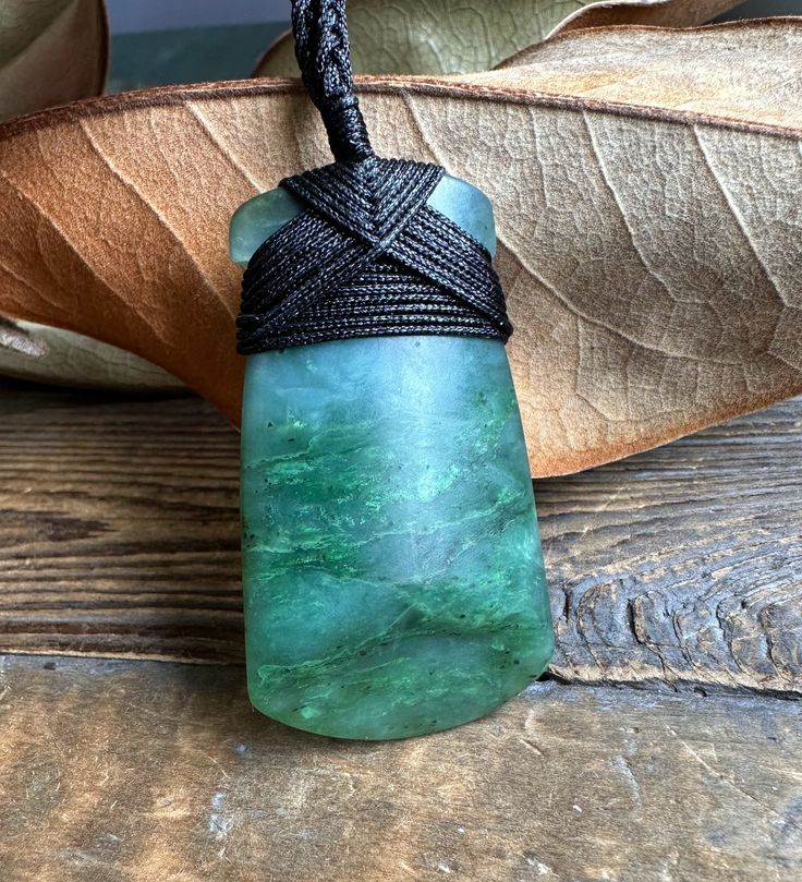 Light Greenish Blue Nephrite Jade Adze Pendant in a satin polish. Each one is uniqueMeasures approximately 2" long on an adjustable nylon cord. Comes with or without our handcrafted wooden gift boxPendant Meaning Adze: Signifies strength, control, determination, and focus Eco Art, Jade Charm, Fun Jewelry, Macrame Knot, Wooden Gift Boxes, Jade Bangle, Jade Earrings, Set Jewelry, Nephrite Jade