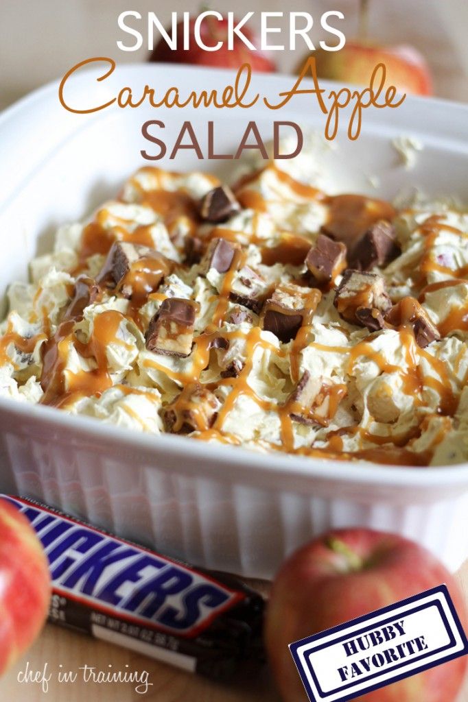 a white bowl filled with food covered in caramel sauce and marshmallows