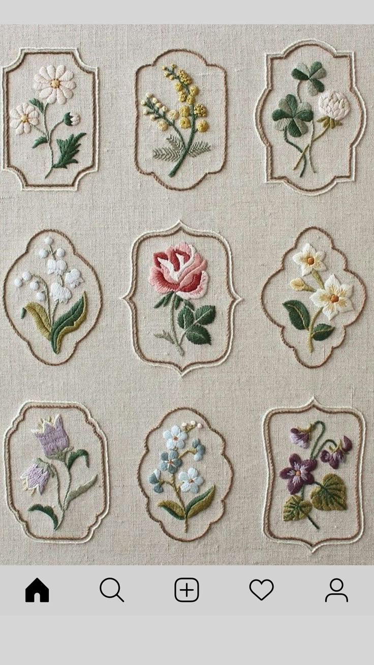 embroidered flowers are displayed on the appliqued fabric, which has been stitched together