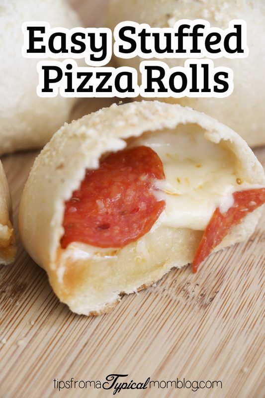 an easy stuffed pizza roll is cut in half