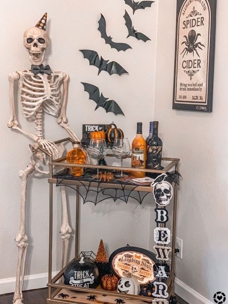 a skeleton is standing in front of a shelf with liquor bottles and decorations on it