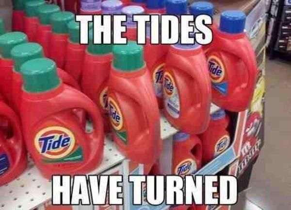 the tide bottles have turned red and green for sale in a grocery store with caption that reads, they're the tides have turned red