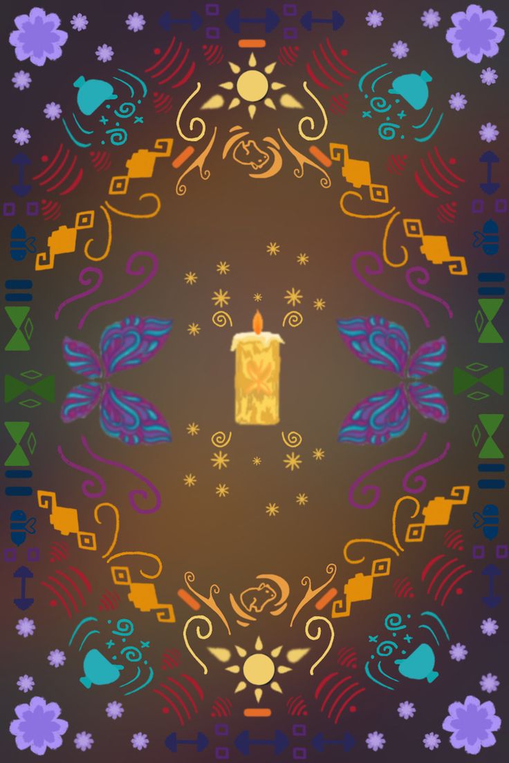 a candle is lit in the middle of a colorful design