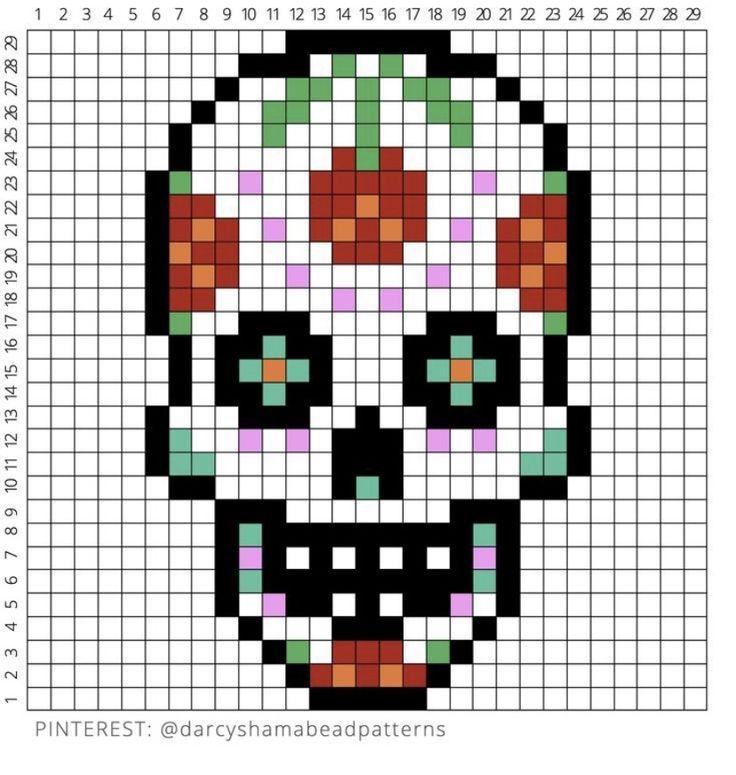 a cross stitch pattern with a skull on it's face in red, white and green