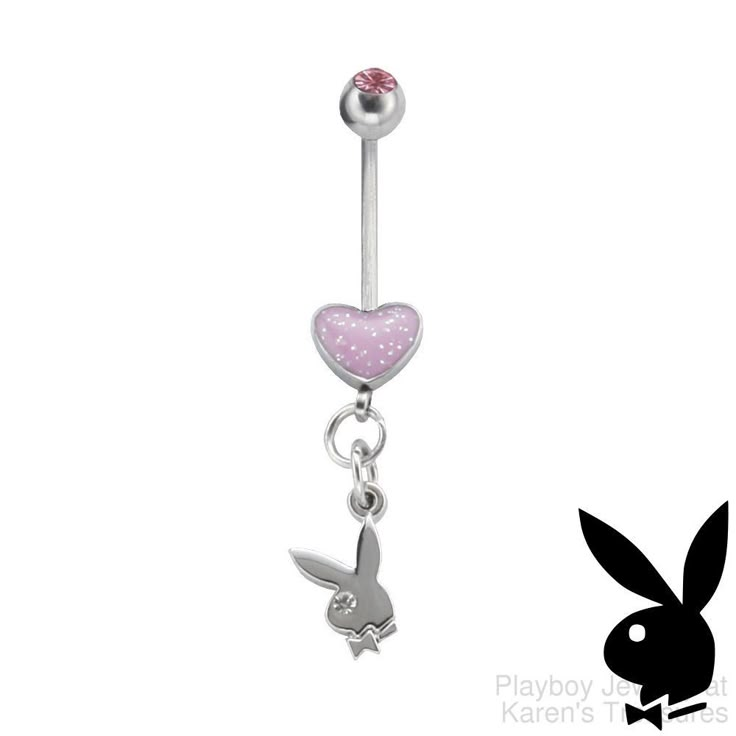 a pink heart shaped belly ring with a pokemon charm hanging from it's side