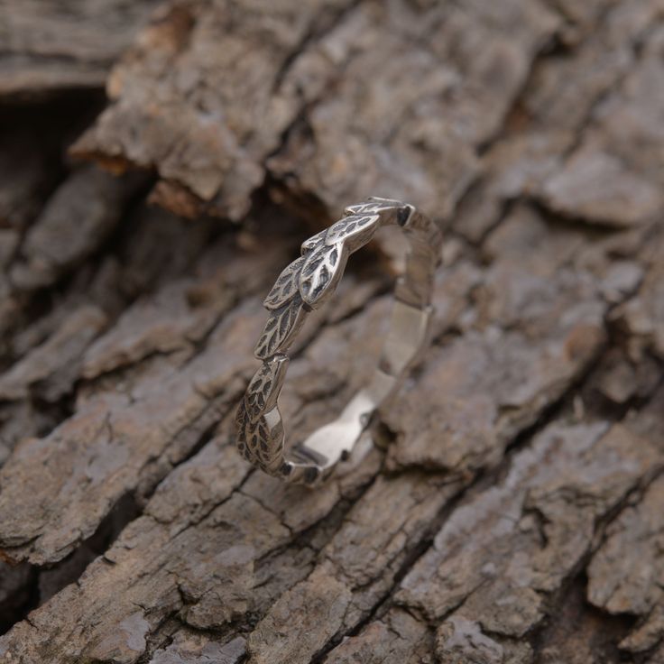 Unique artistic ring with leaves in sterling silver. Tree branch ring 3.5mm wide. Nature inspired engagement ring. Friendship and nature lover artistic gift. Bohemian chic sterling silver leaf jewellery. Personalized with an engraved message on the inside. A twig oxidized sterling silver ring for women who enjoy the outdoors and nature. What makes this handmade 3.5 width ring so special is the texture and style of the oxidized sterling silver that resembles a small tree branch with various leave Handmade Silver Engraved Ring, Nature-inspired, Handmade Nature-inspired Silver Engraved Ring, Silver Nature-inspired Stackable Rings For Promise, Silver Nature-inspired Stackable Rings For Anniversary, Nature-inspired Silver Stackable Rings For Anniversary, Nature-inspired Silver Stackable Rings, Silver Stackable Promise Rings With Nature-inspired Style, Elegant Silver Leaf-shaped Ring, Elegant Silver Leaf Shaped Ring