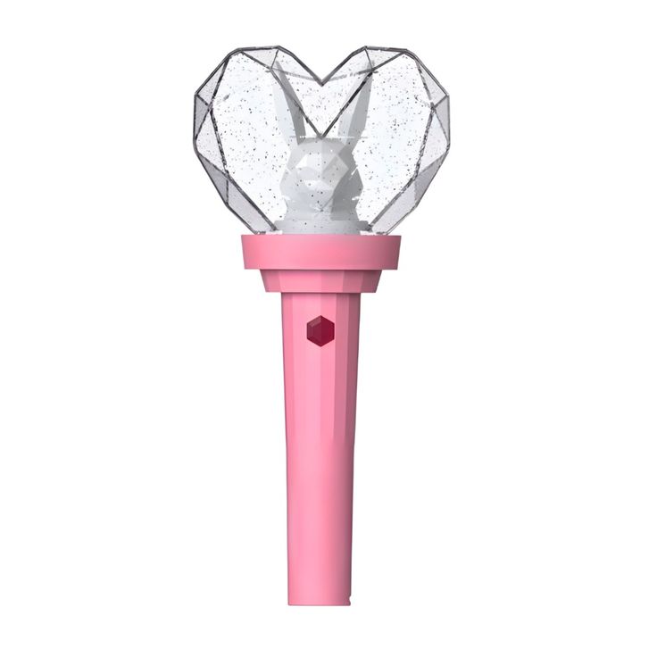 a pink and white heart shaped object on top of a plastic stick with glitter inside