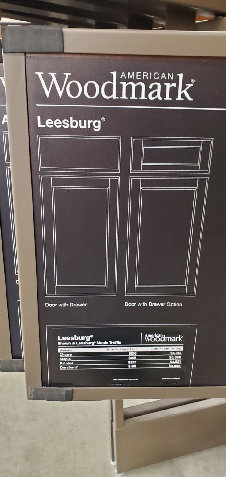 an advertisement for the american woodmark leesburg cabinet in a grocery store's display