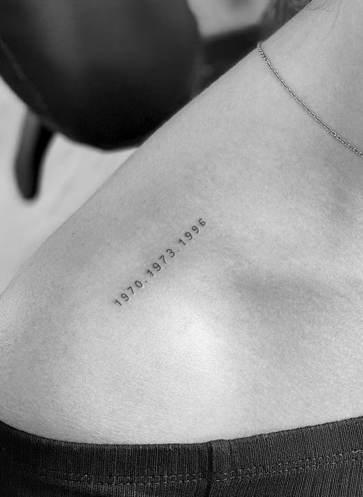 a woman with a tattoo on her chest saying, never let go and get lost