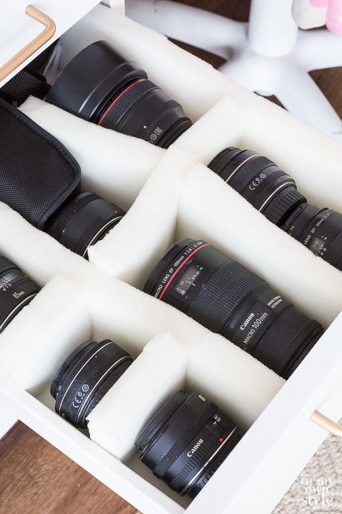 a box filled with lots of different types of camera lens gear in it's storage compartment