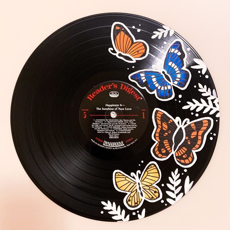 a vinyl record with butterflies on it