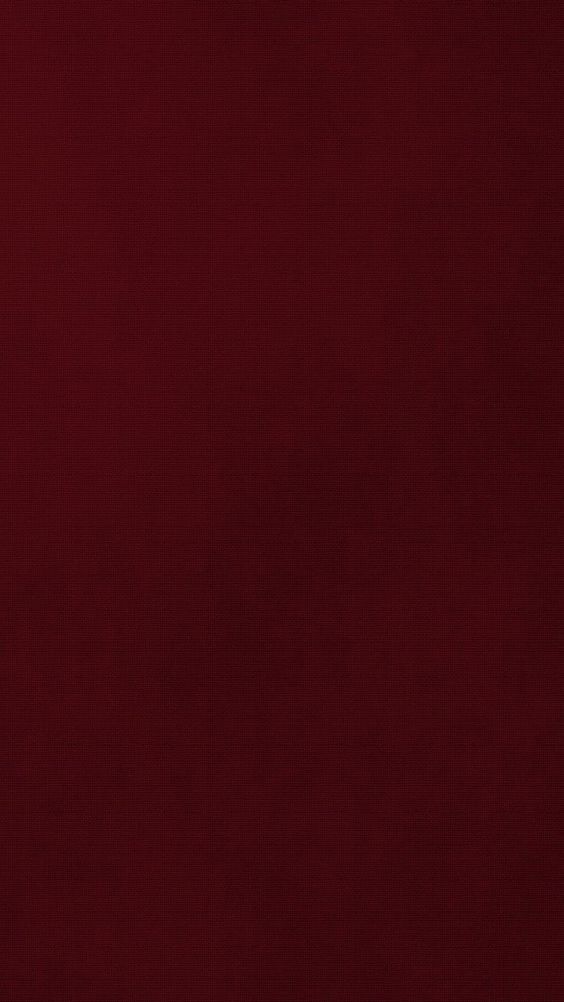 an image of a red textured background that looks like it has been painted in different shades