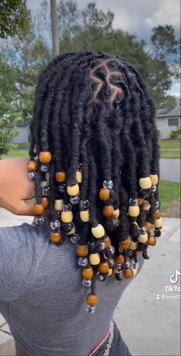 Loc Style With Beads, 70s Hairstyles Locs, Dreadlock With Beads, Locs Hairstyles With Beads, Beads On Locs Styles, Locs With Beads Black Women, Locs And Beads, Loc Styles With Beads, Short Locs With Beads