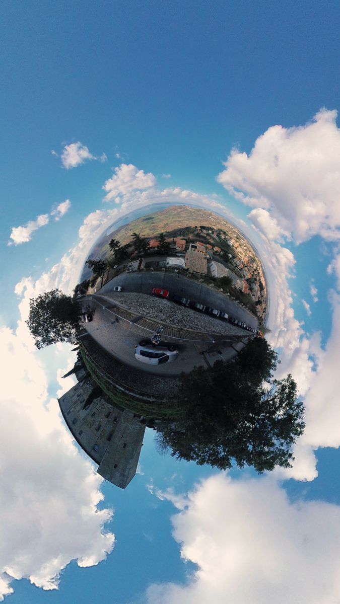 an upside down view of the sky and clouds