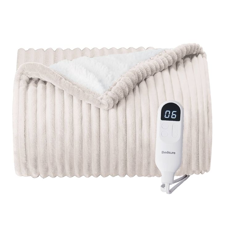 an electric heated blanket is shown with thermometer on it's back end