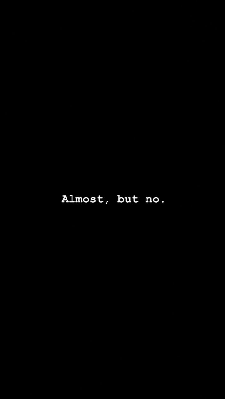 the words almost, but no written in white on a black background