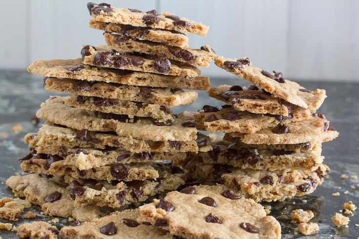 a stack of cookies with chocolate chips on top