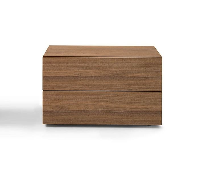 a small wooden box sitting on top of a white surface