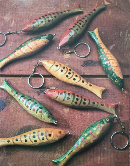 several different types of fishing lures laid out on a table