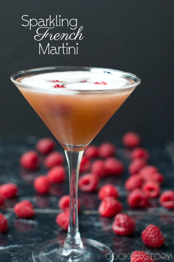 a martini with raspberries in the background and text overlay reading sparkling french martini