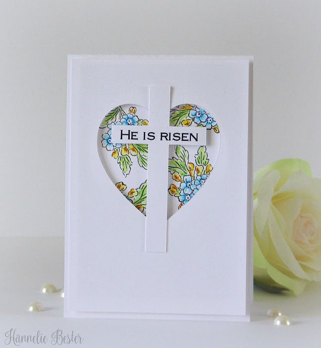 a card with a heart cut in half and the words he is risen written on it