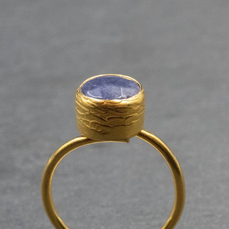 Handmade Blue Sapphire Ring, 24k Gold-Plated Brass Gemstone Ring, Adjustable Ring, Statement Sapphire Jewelry, Gift for Her Ring An elegant handmade ring with a natural faceted dark blue sapphire. The ring band and the bezel setting are made of 24 karats gold-plated brass. The ring is slightly adjustable Sapphire is September's lucky birthday stone and it is supposed to bring "Peace of Mind"   Ring band width 1.5 mm Blue Sapphire 9 mm approx. This is more of my Rings collection: http://www.etsy. Birthday Stone, Saphir Ring, Her Ring, Greek Jewelry, Blue Sapphire Ring, Rings Collection, Blue Sapphire Rings, Sapphire Jewelry, Ring Collections