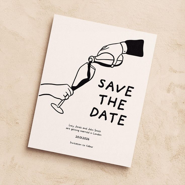 a wedding save the date card with two hands holding each other's hand, on a beige background