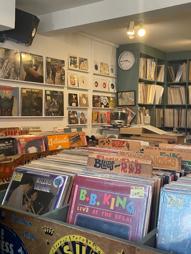 a room filled with lots of records and cds