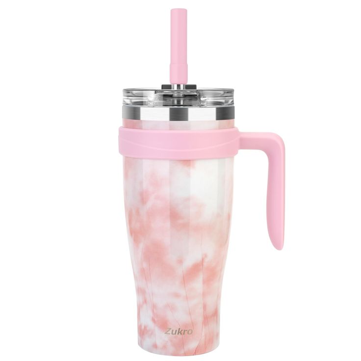 a pink and white coffee cup with handle