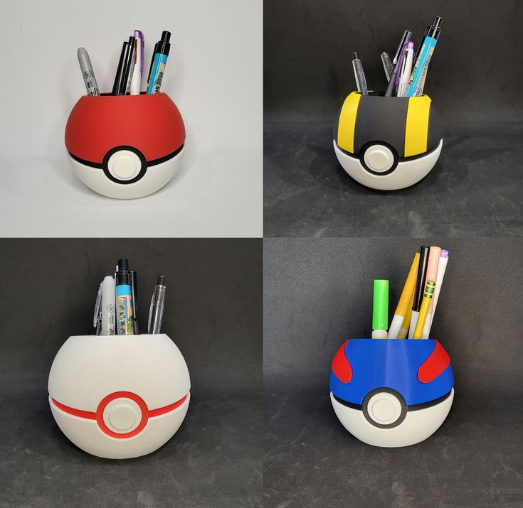 four different types of pens and pencils in a pokeball shaped container with the same design on it