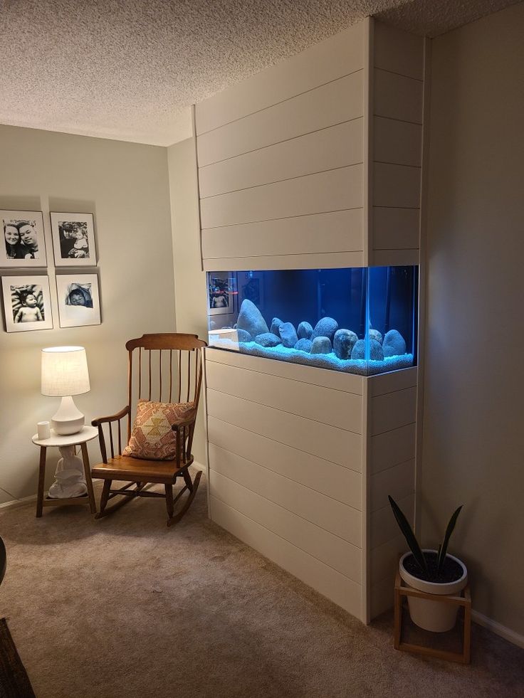 an aquarium in the corner of a room