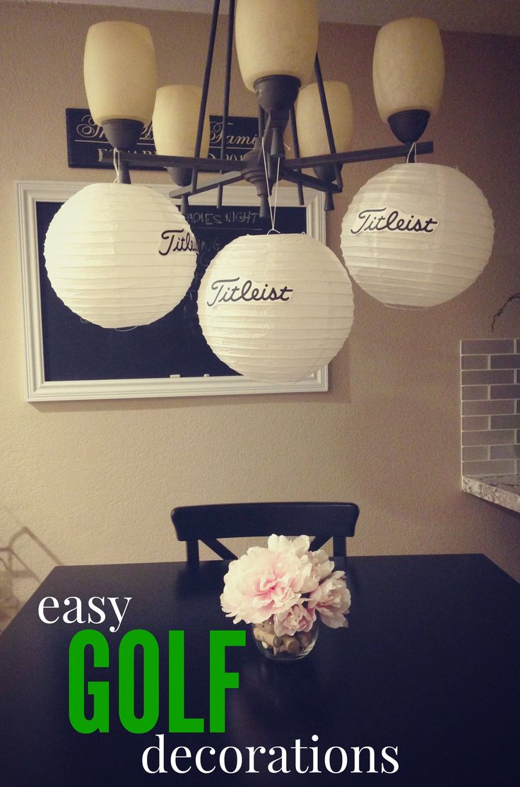 a dining room table with four lamps hanging from it's ceiling and the words easy golf decorations above it